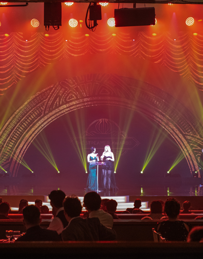 Arena interior center stage illuminated by blue light